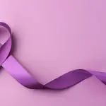 Disturbi alimentari: a Trento la fontana del Nettuno si illumina di viola per il Fiocchetto lilla